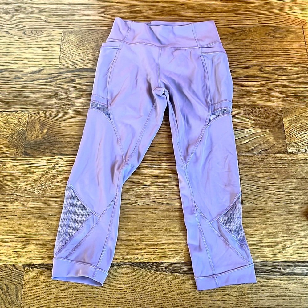 Lululemon Cropped Lavender Leggings with fishnet detailing on the sides